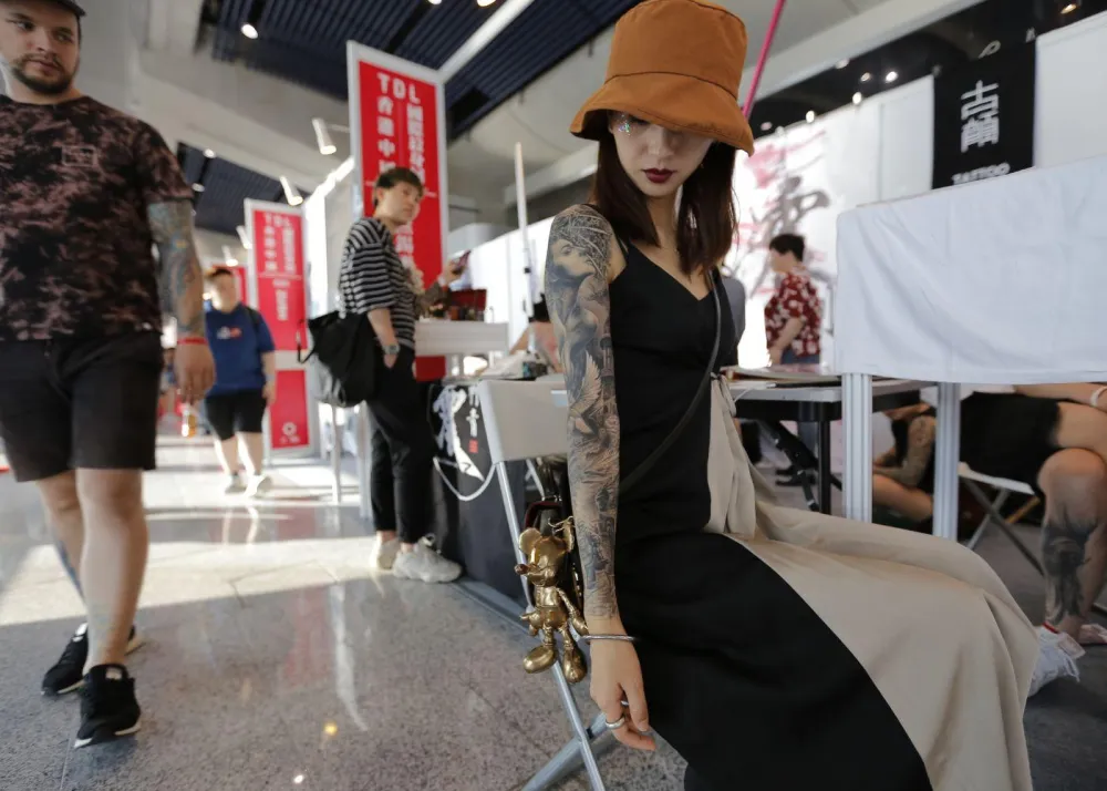 Woman getting tattoos