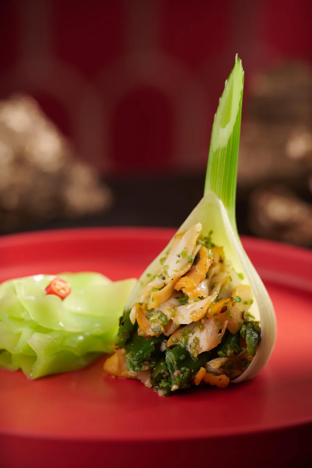 The dish features a secret grilled chilli sauce.