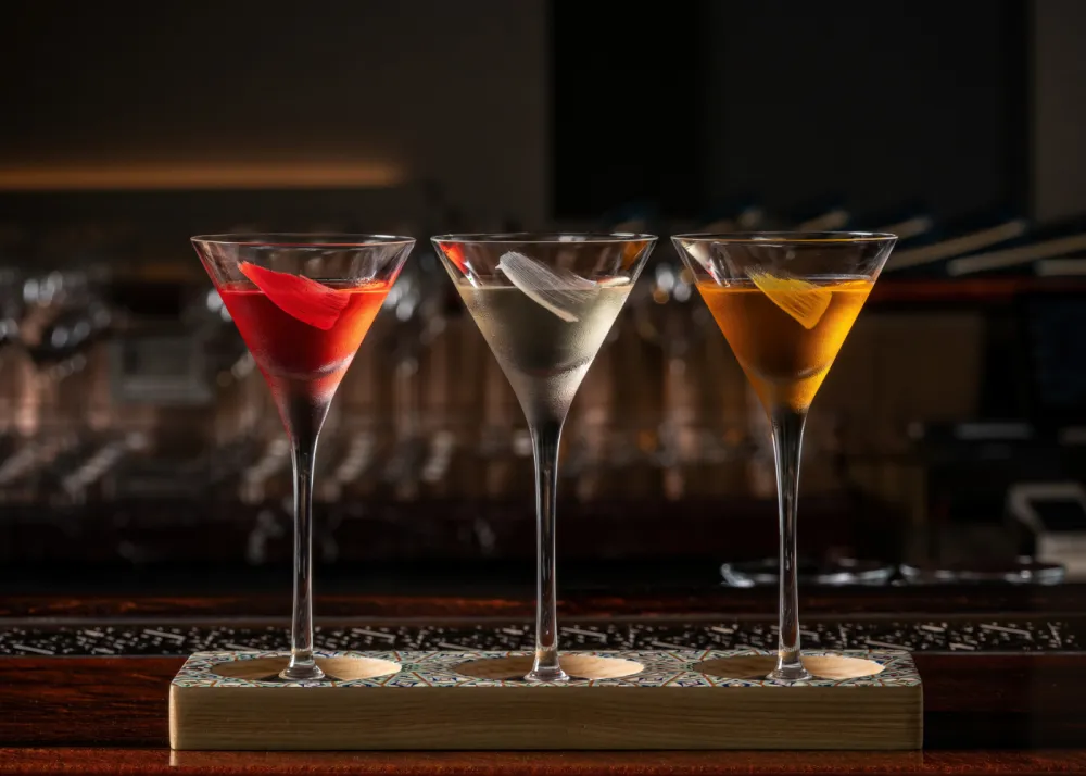 A row of cocktails from Calēo Bar