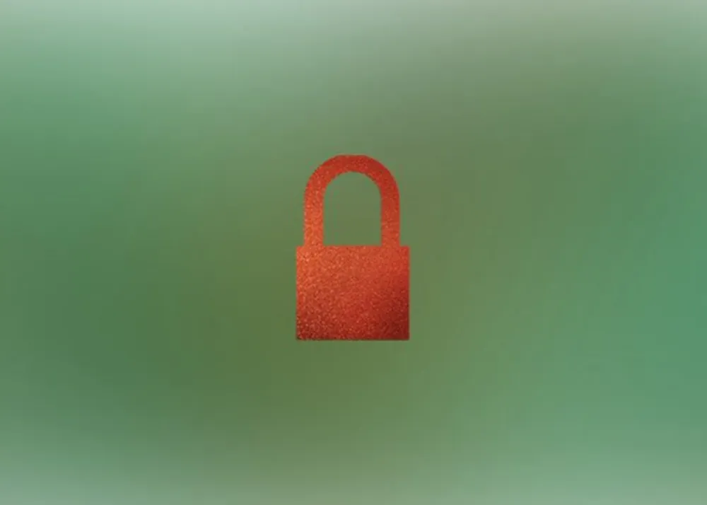 A blurred green background with an orange lock