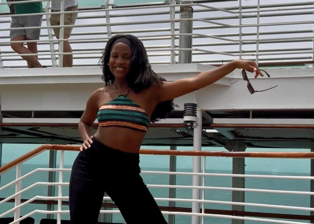 StarCruises’ “Star Voyager” entertainment team member dancing
