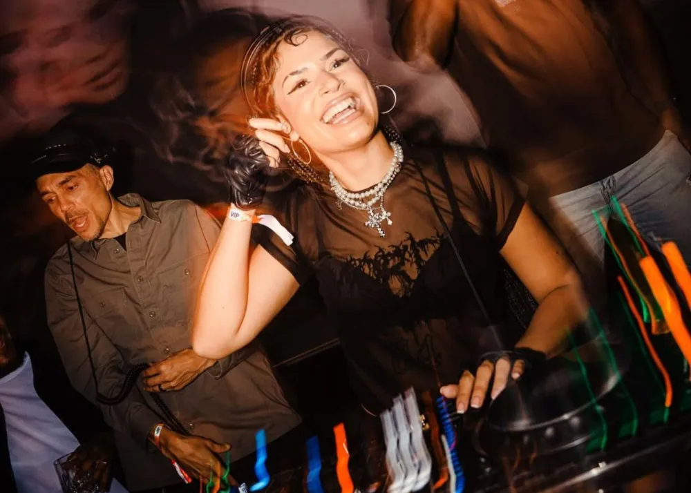 DJ Nems on the deck at The Trilogy's party