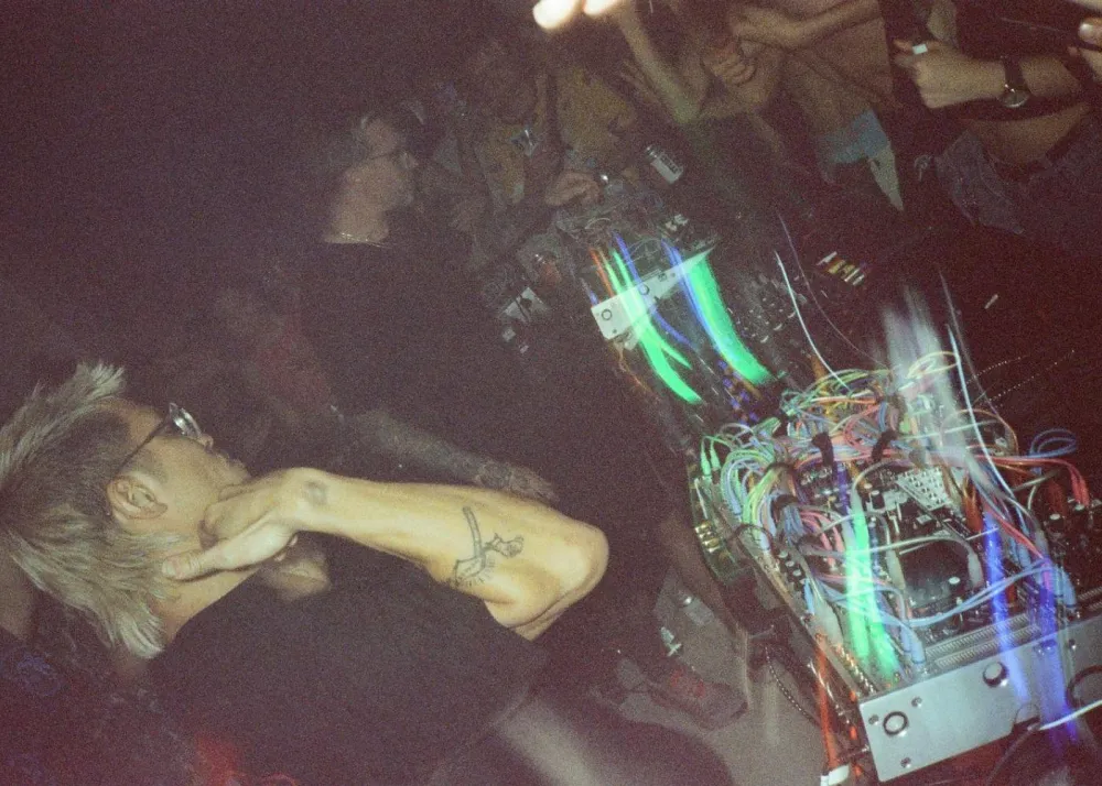 The Glitch Mob on the deck at a Hong Kong underground party