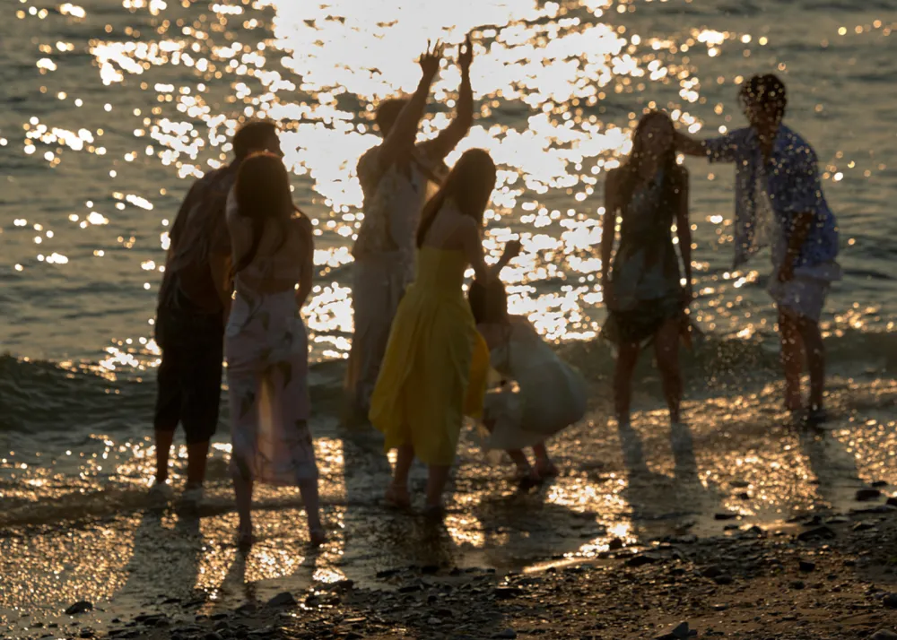 A group of people on the beach