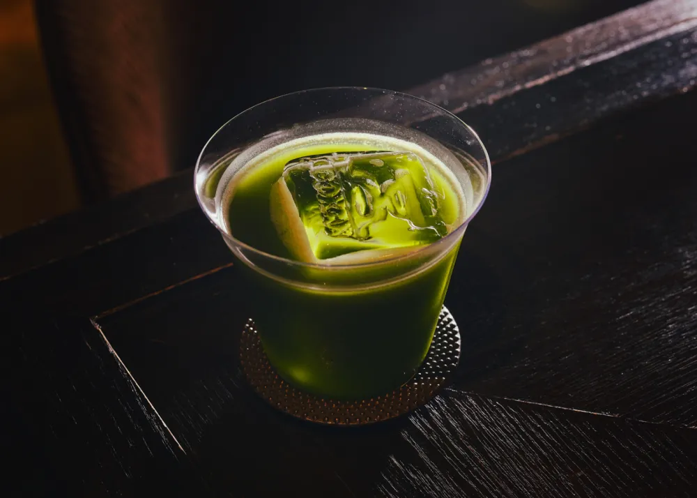 A cocktail with matcha