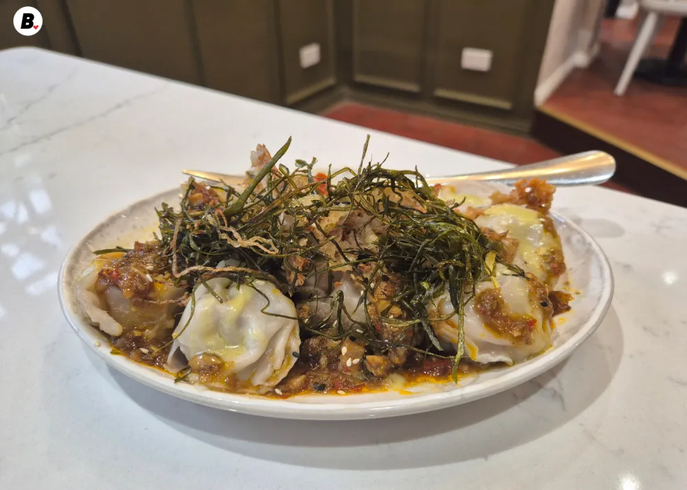 A comforting classic made with minced pork, fresh shrimp, and Asian aromatics