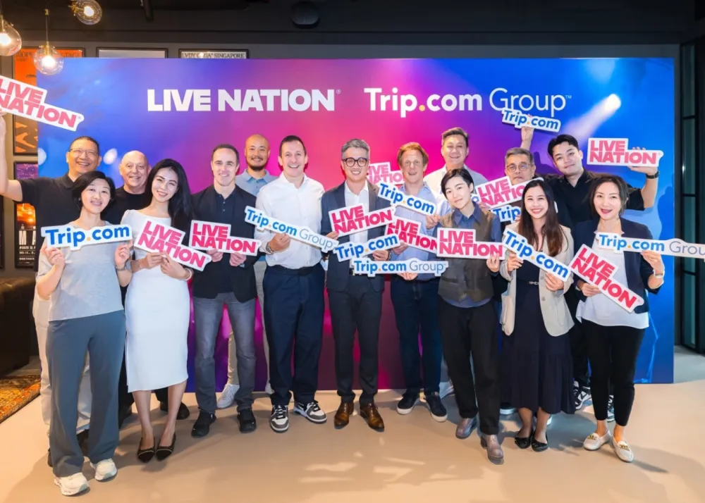 Representatives from Live Nation Asia and Trip.com Group pose for a picture