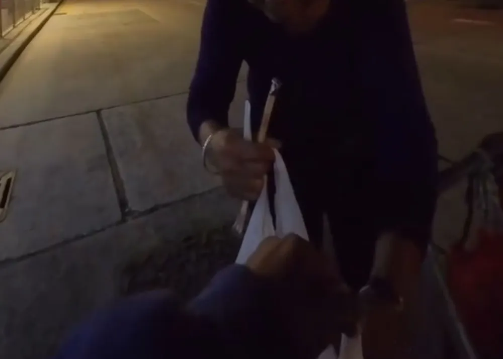 Screenshot of her reel, where she distributed meals to those in need