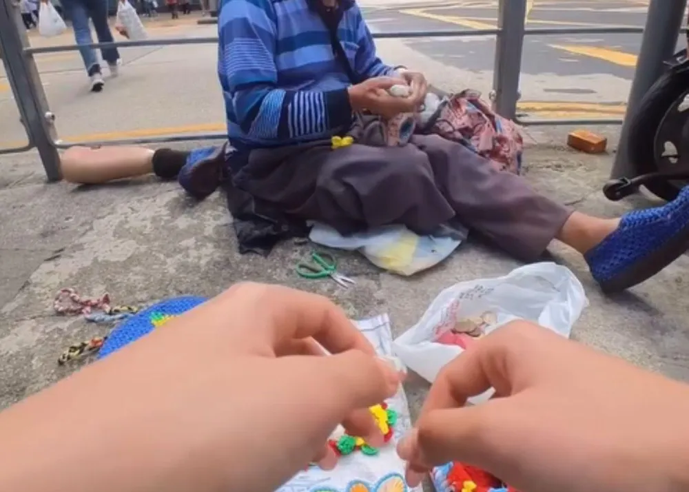 Screenshot of her reel, where she distributed meals to those in need