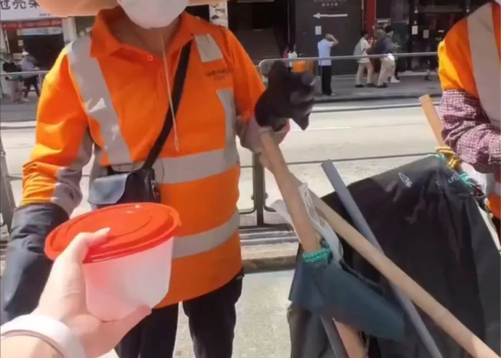 Screenshot of her reel, where she distributed meals to those in need