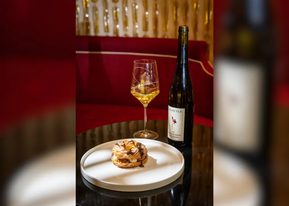 A white plate featuring Paris-Brest
