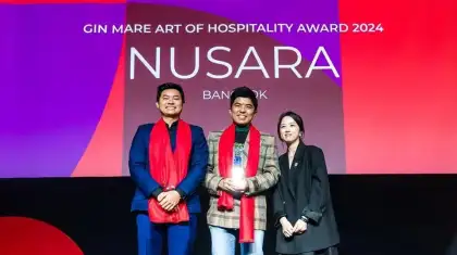 Chef Ton receiving the Gin Mare Hospitality Award in 2024 for Nusara