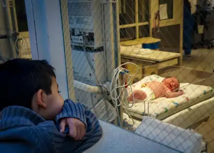 Baby Sibling Stock