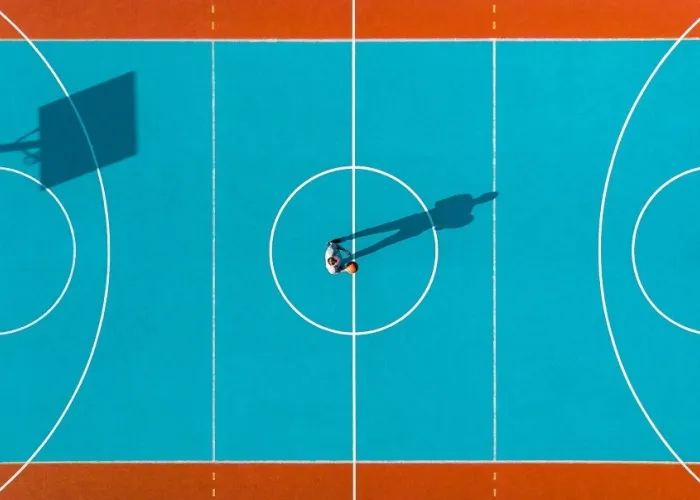 Basketball player long shadows on basketball cour 2021 08 26 16 37 20 utc