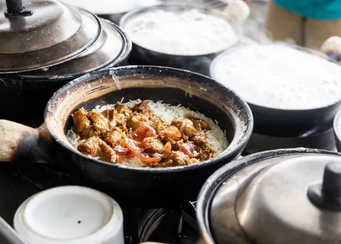 Steamy hot clay pot chicken rice being cooked in r 2021 09 01 22 35 53 utc