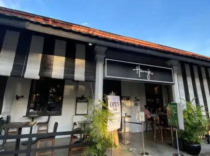 Exterior photo of a bar with a view of the sky