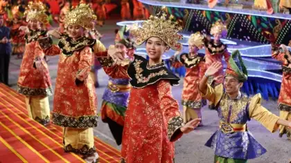 people in cultural costumes