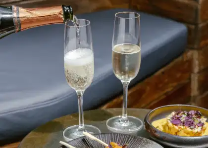 champagne pouring on flutes
