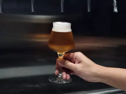 draft beer with hand