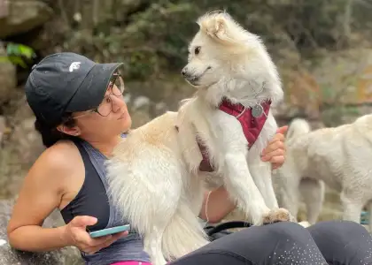 exploring dogs stephanie lown looking at lola sitting on her lap