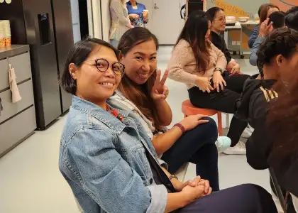 director of programmes tynna mendoza in audience at enrich hk charity event