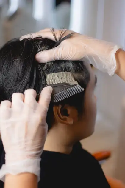 Seamud is applied thoroughly to all areas of the scalp