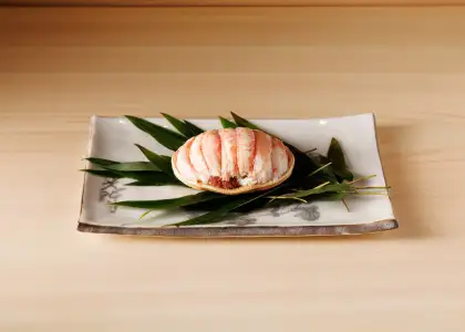 sushi on a plate with leaves