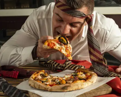 dad eating pizza with necktie