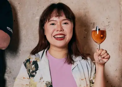 woman drinking a beer
