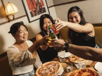 ladies toasting drinks