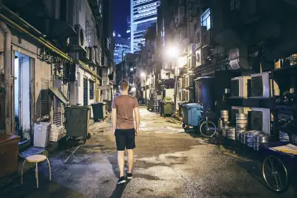 You man in singapore alley standing