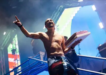 Steve Aoki holding and Slinging Cake at Ultra Hong Kong