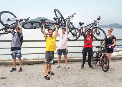 HK biking team celebrating on the route