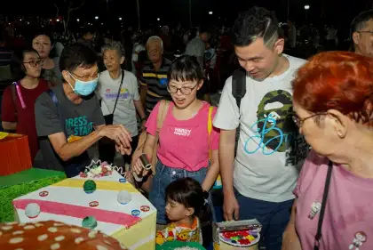 Families celebrate the incredible installation