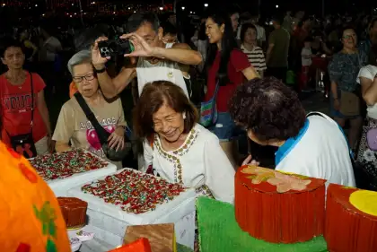 Families at the "Kueh-Normous Creations" installation