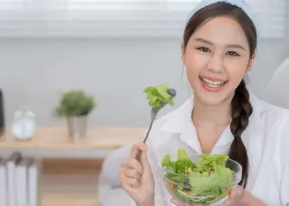 Woman eating Salad