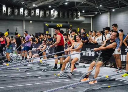 Hyrox contestants pulling rope