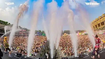 Festivalgoers getting soaked wet during a performance at Waterbomb