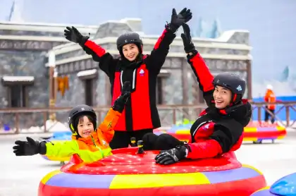 Family of Three Skiing in China