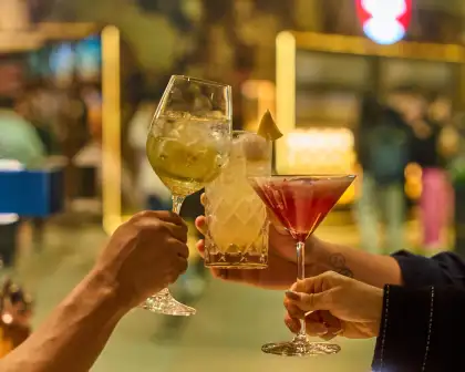 Guests can enjoy the Japanese Whisky Sour Fizz (Left), the CMCR Clover Club (Right), and other cocktails, beer, and wine.
