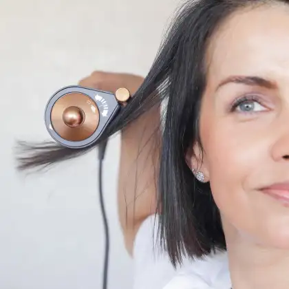 The Dyson Airwrap dryer and flyaway smoother