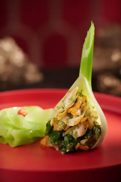 The dish features a secret grilled chilli sauce.