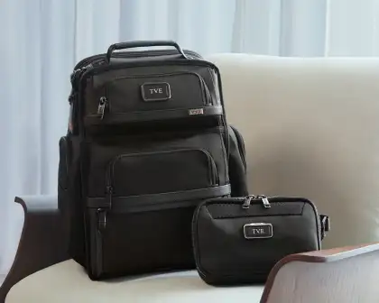 The Alpha International Dual Access Carry-On backpack is a classic choice for frequent travelers.