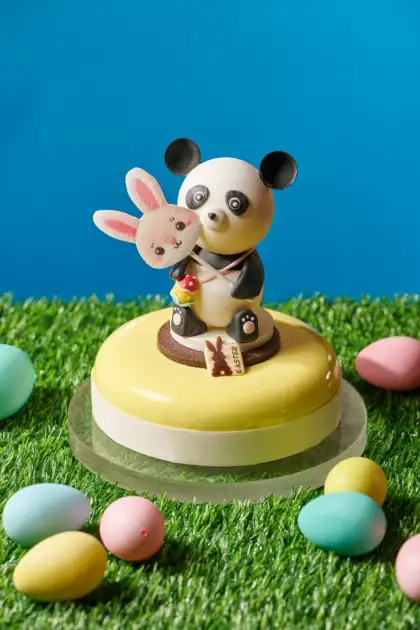 The "Panda Masquerade" cake with a 3D panda on top.