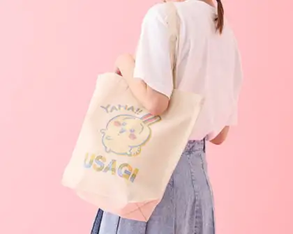 A tote bag modeled by a girl