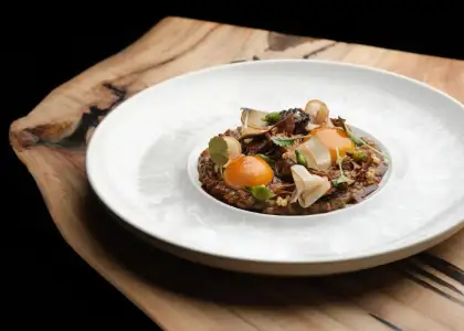 Maitake mushroom, miso butter, grains, 3 yellow soft yolk and burnt chives 0