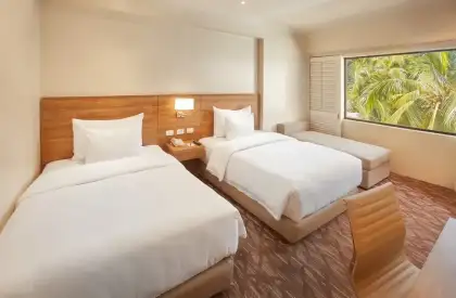 The deluxe room with two single beds.