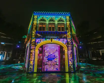 The Peranakan House transforms into a vivid projection-mapped canvas by night and is adorned with intricate detailing and bold colours.