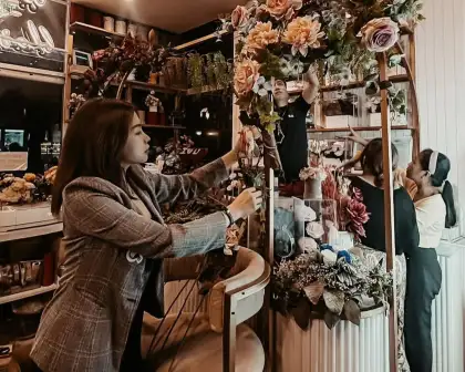 Jem Tinsay working on a floral arrangement for Boxed Blossoms