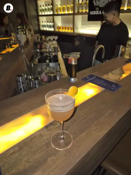 The 39th Ward, made with Nikka Coffey Grain Whisky, dalandan, lemon, and homemade grenadine